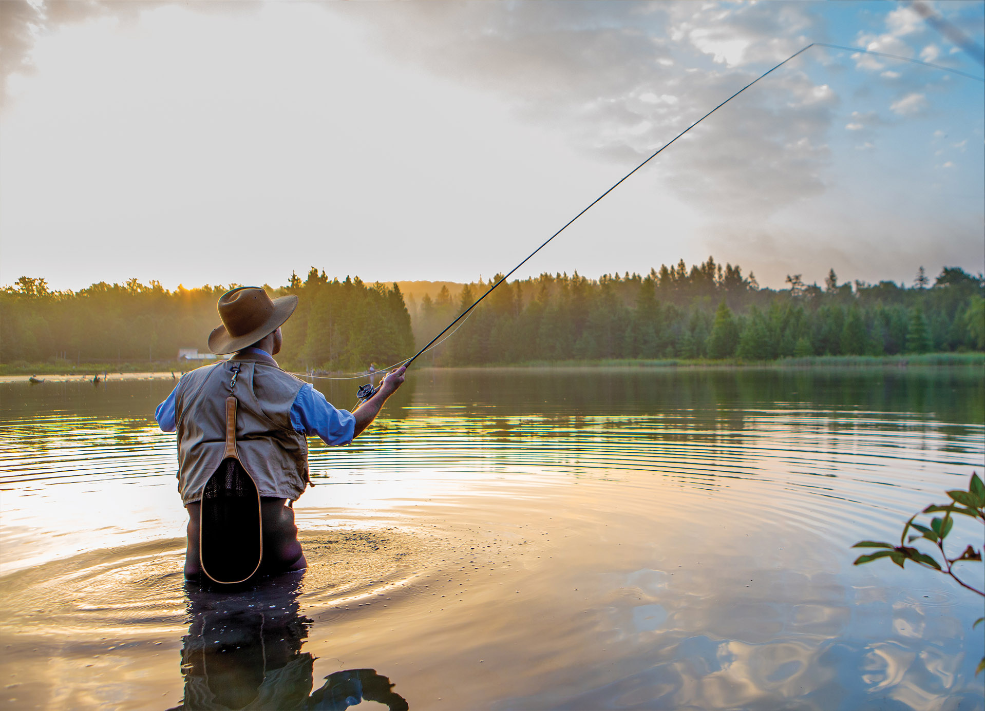 Tapeta Rybář ve vodě